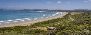Cloudy Bay Cabin holiday accommodation is an off grid log cabin right on the beach